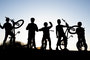 Feature Photo 2nd: Bike Buds Ride into Sunset by Taylor Weaver, Meridian Source